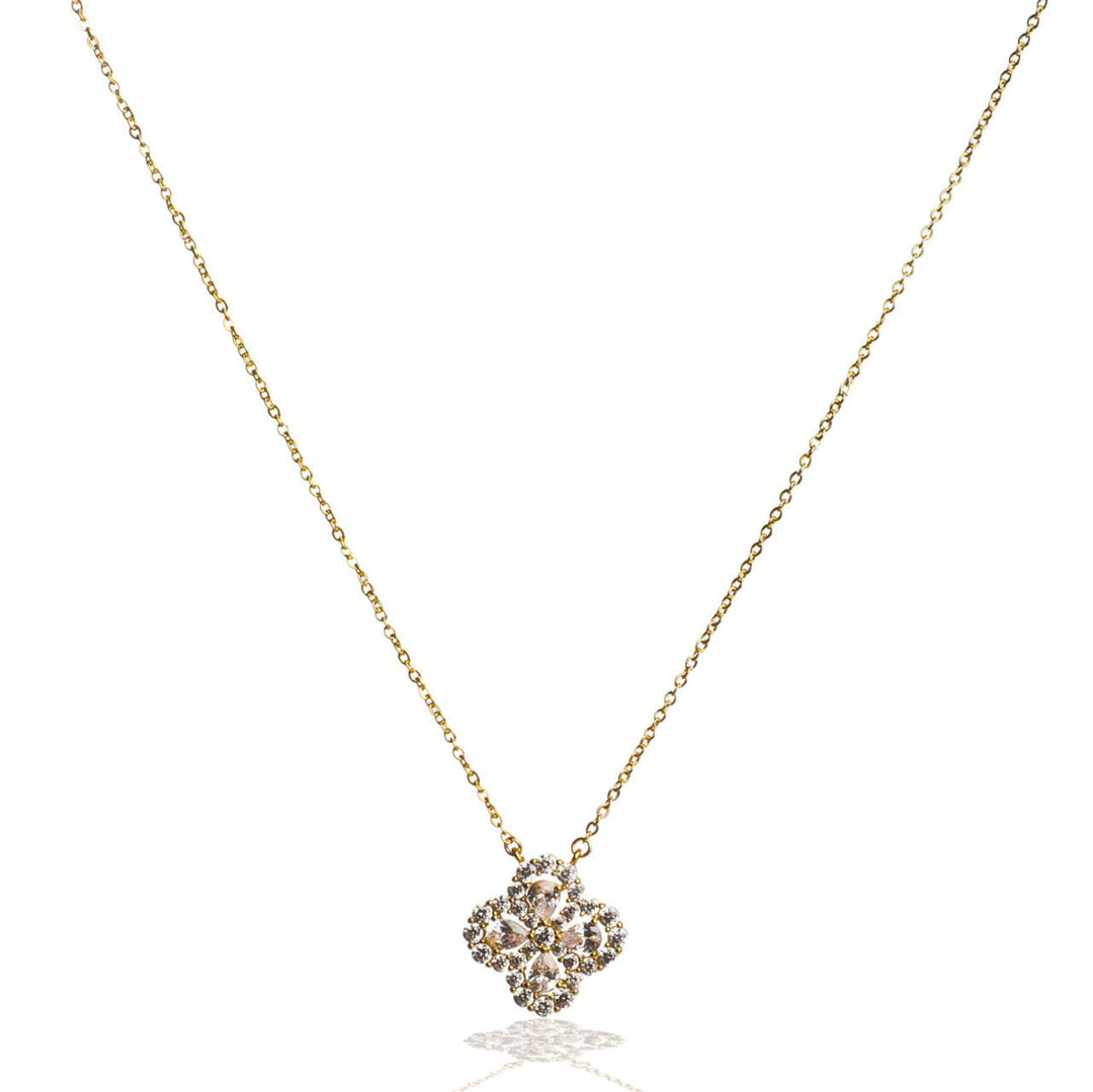 Gold Zelly necklace from the Amar Constellation Collection featuring delicate star-shaped charms, by Cornucopia Home and Gift.