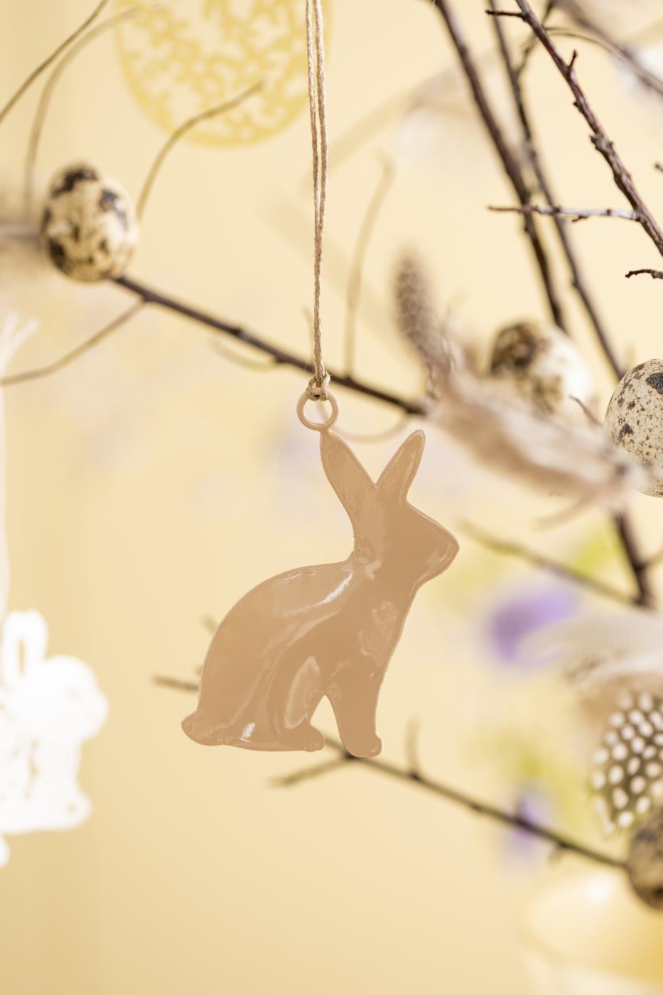 Orange hanging bunny or rooster decoration for summer, by IB Laursen, from Cornucopia Home and Gift, shown hanging on a display.