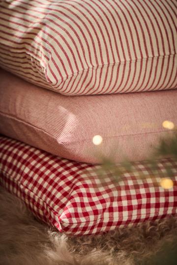 Red striped IB Laursen Christmas cushion with cozy fabric and festive pattern, perfect for holiday home decor.
