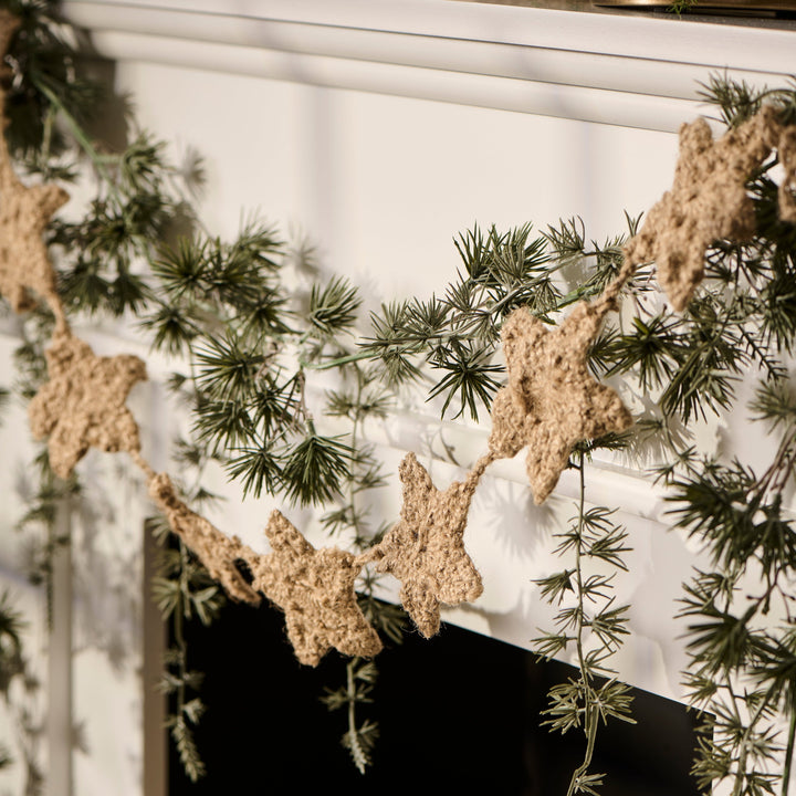 Crocheted jute string with star patterns for IB Laursen Christmas decor by Cornucopia Home and Gift.