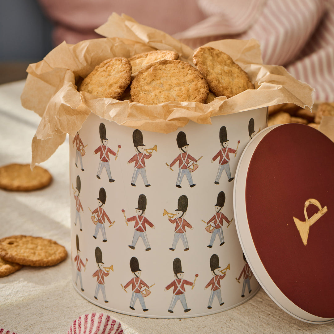 Round IB Laursen Christmas cake tin with protective guards, ideal for baking and storing festive cakes.