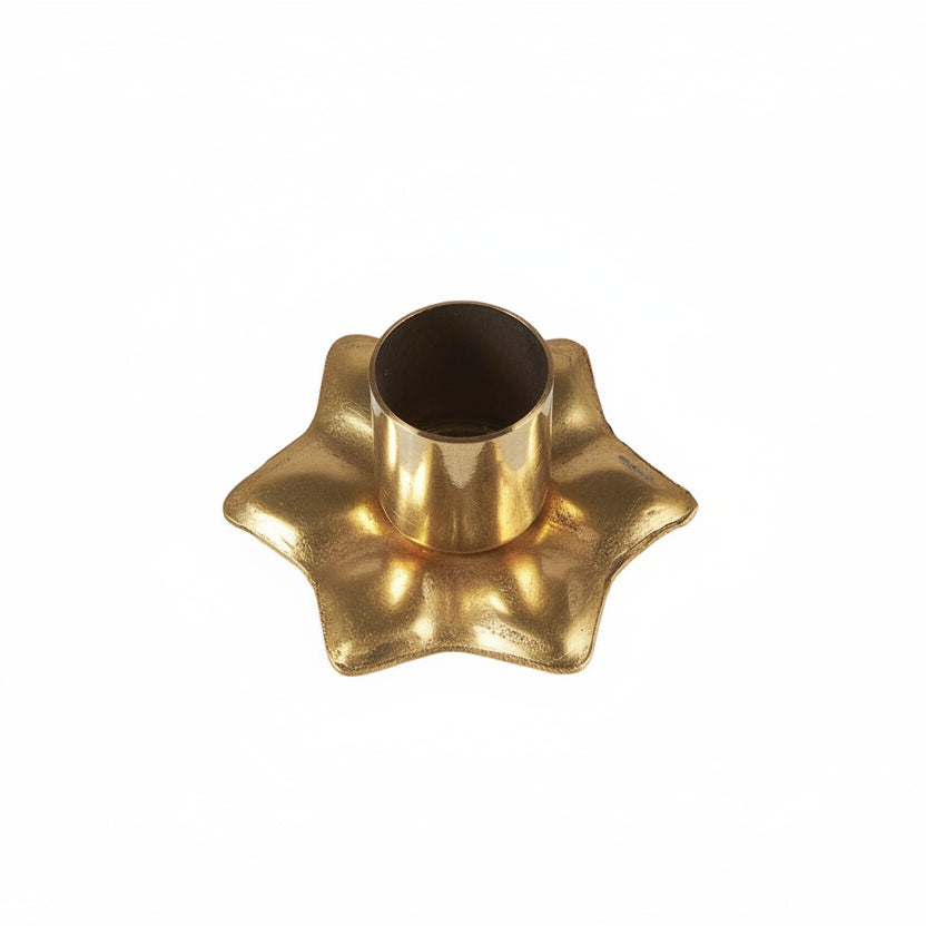 Gold star-shaped candle holder from IB Laursen Christmas collection, designed by Cornucopia Home and Gift, featuring a festive holiday style