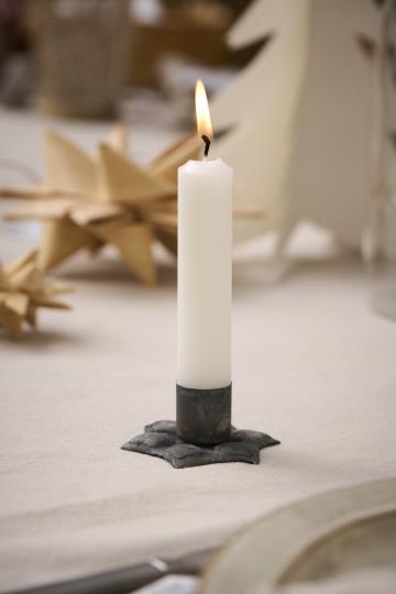 Star-shaped IB Laursen Christmas candle holder by Cornucopia Home and Gift, featuring a festive design with a candle inside.