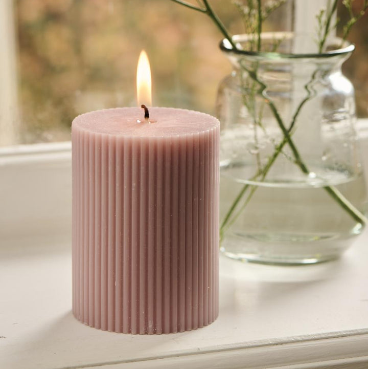 Light pink IB Laursen Summer grooved pillar candle with textured surface, ideal for home decor and ambiance.