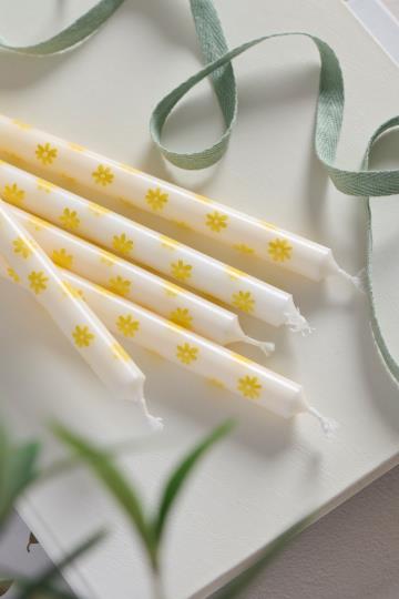 IB Laursen Summer taper candle with yellow floral design, featuring vibrant yellow flowers on a white candle.