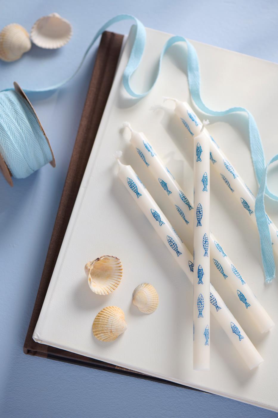 Blue fish taper candle from IB Laursen Summer collection, featuring a detailed aquatic design, ideal for coastal decor.