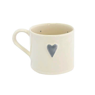 Grey heart-shaped 250ml ceramic mug from Cornucopia Home and Gift's Shaker Grey Heart collection, featuring a cozy, modern design.