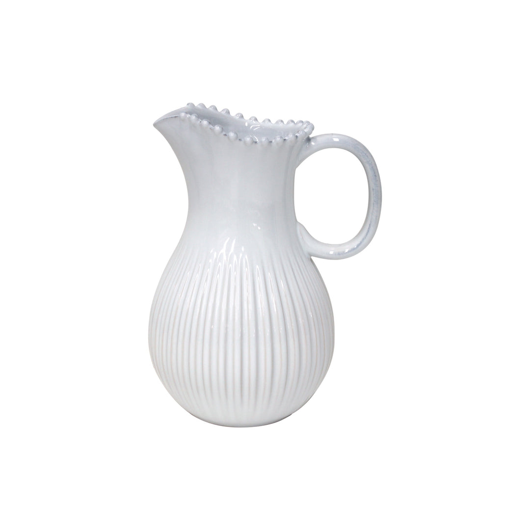 Pearl white ceramic pitcher from Cornucopia Home and Gift, featuring a smooth, glossy finish and elegant design.