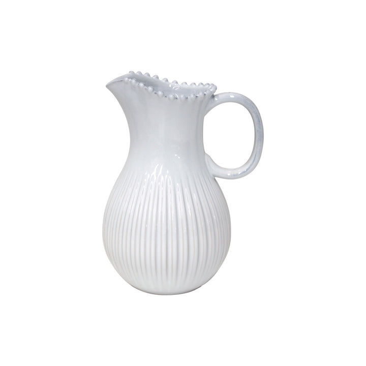 Pearl white ceramic pitcher from Cornucopia Home and Gift, featuring a smooth, glossy finish and elegant design.