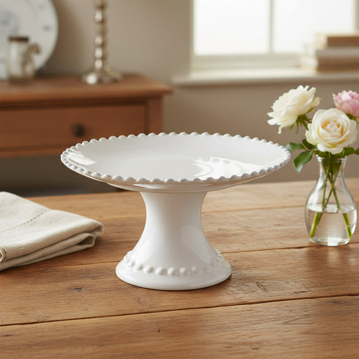 Small pearl white footed plate from Cornucopia Home and Gift&