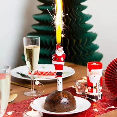 Father Christmas Singing Christmas Pudding Fountain from Talking Tables with festive holiday design and vibrant colors.