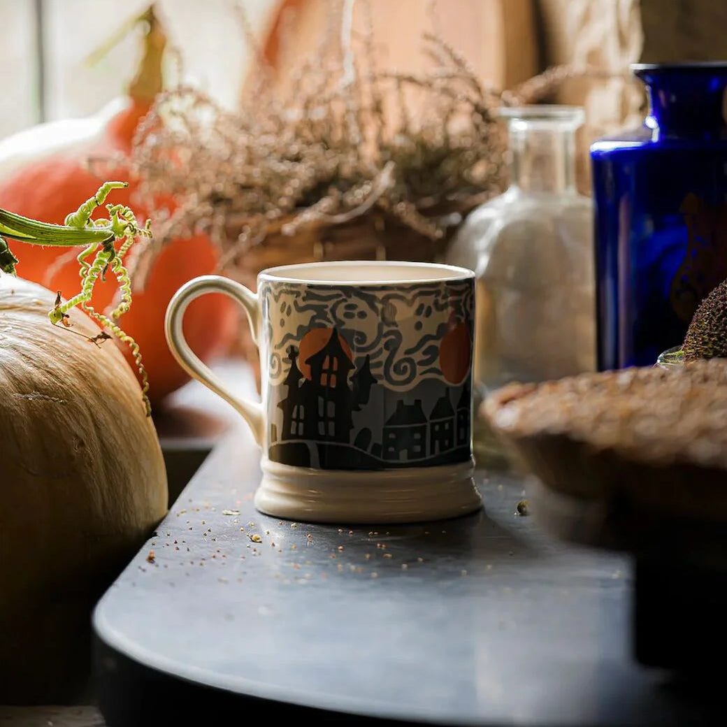 Emma Bridgewater Wise Witches large ceramic mug featuring whimsical witch illustrations and bold black handle.