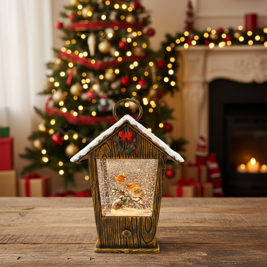 Robin House Water Spinner from Straits Christmas by Cornucopia Home and Gift, featuring a colorful robin design spinning on water.