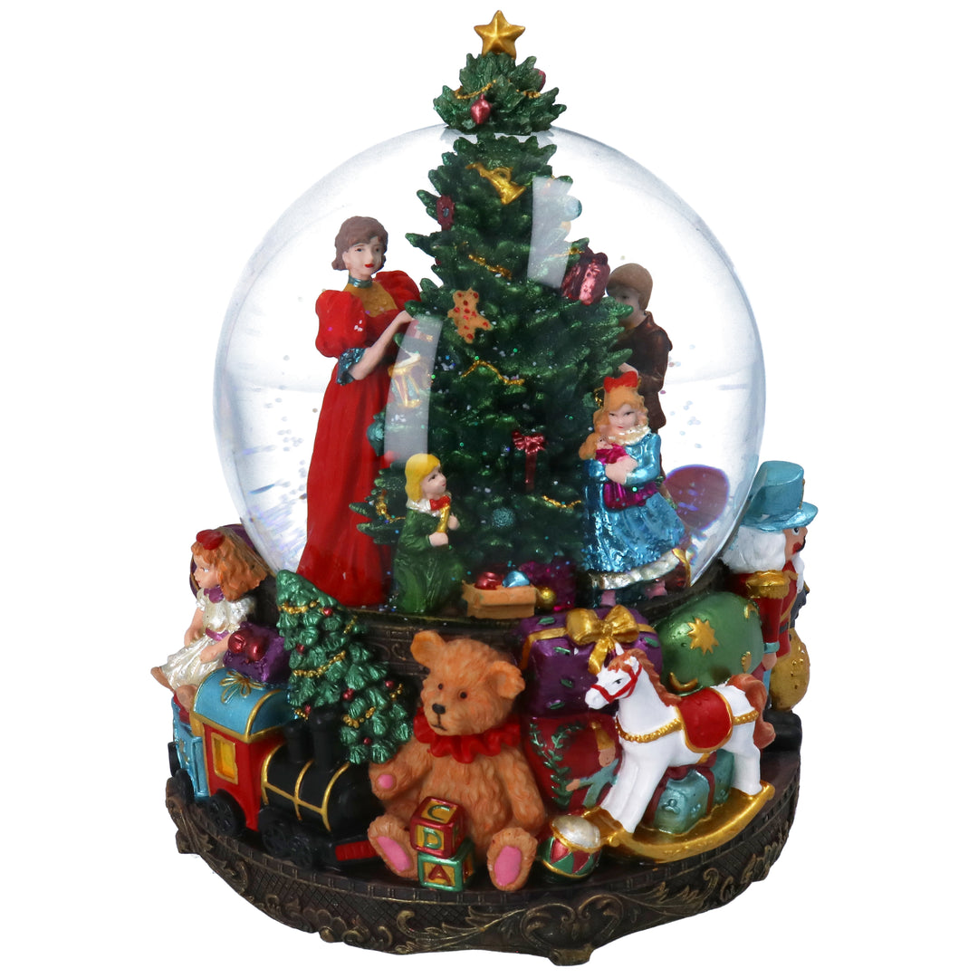 Large Gisela Graham Christmas family snow dome with festive scene and music box, featuring snow and holiday decorations.