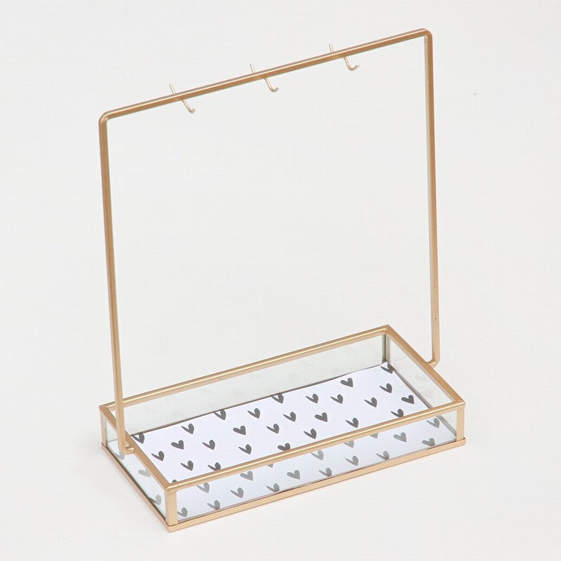 Caroline Gardner gold jewelry stand with hooks and compartments for organizing necklaces, rings, and bracelets.