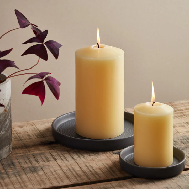 Large dark grey St Eval candle holder with a textured ceramic finish, perfect for decorative candle display.