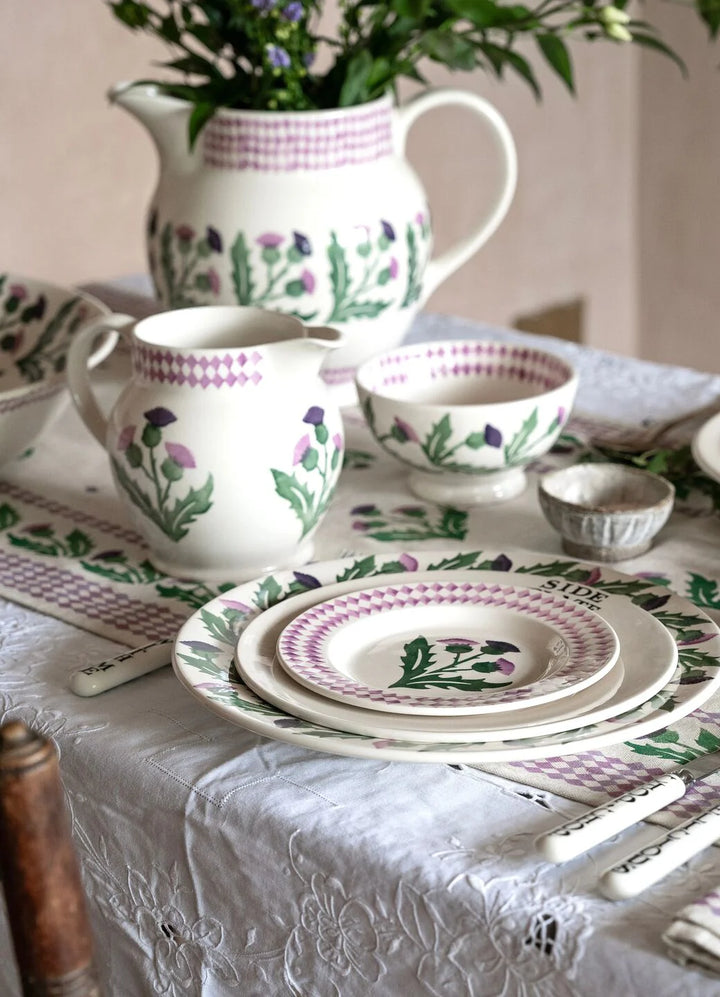 Emma Bridgewater Thistle 1½ pint ceramic jug with a floral thistle pattern on a white background.