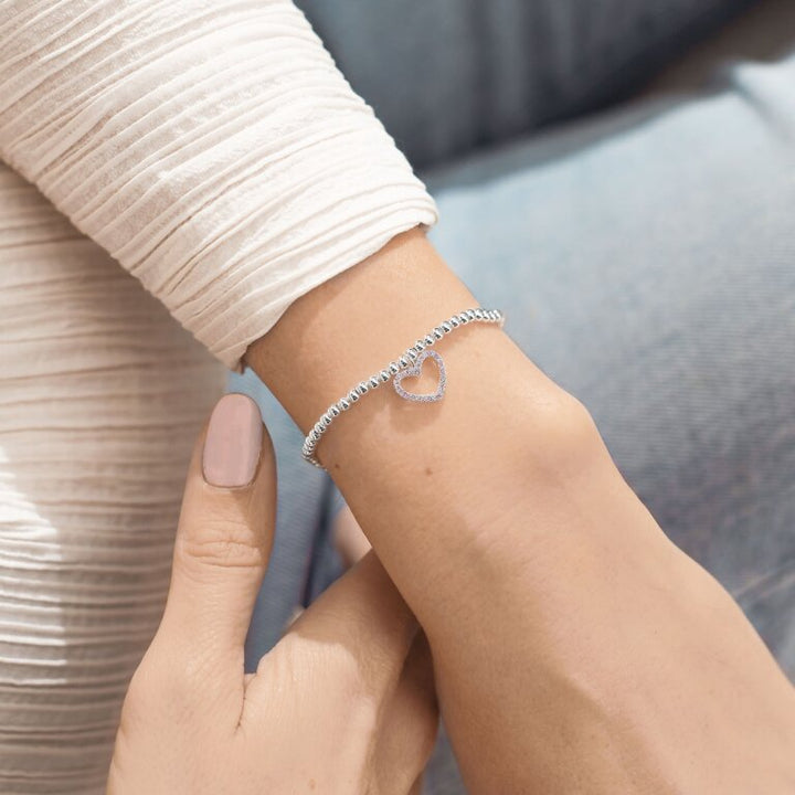 Joma Jewellery A Little Thank You Bracelet with delicate charm and silver finish, displayed on a neutral background.