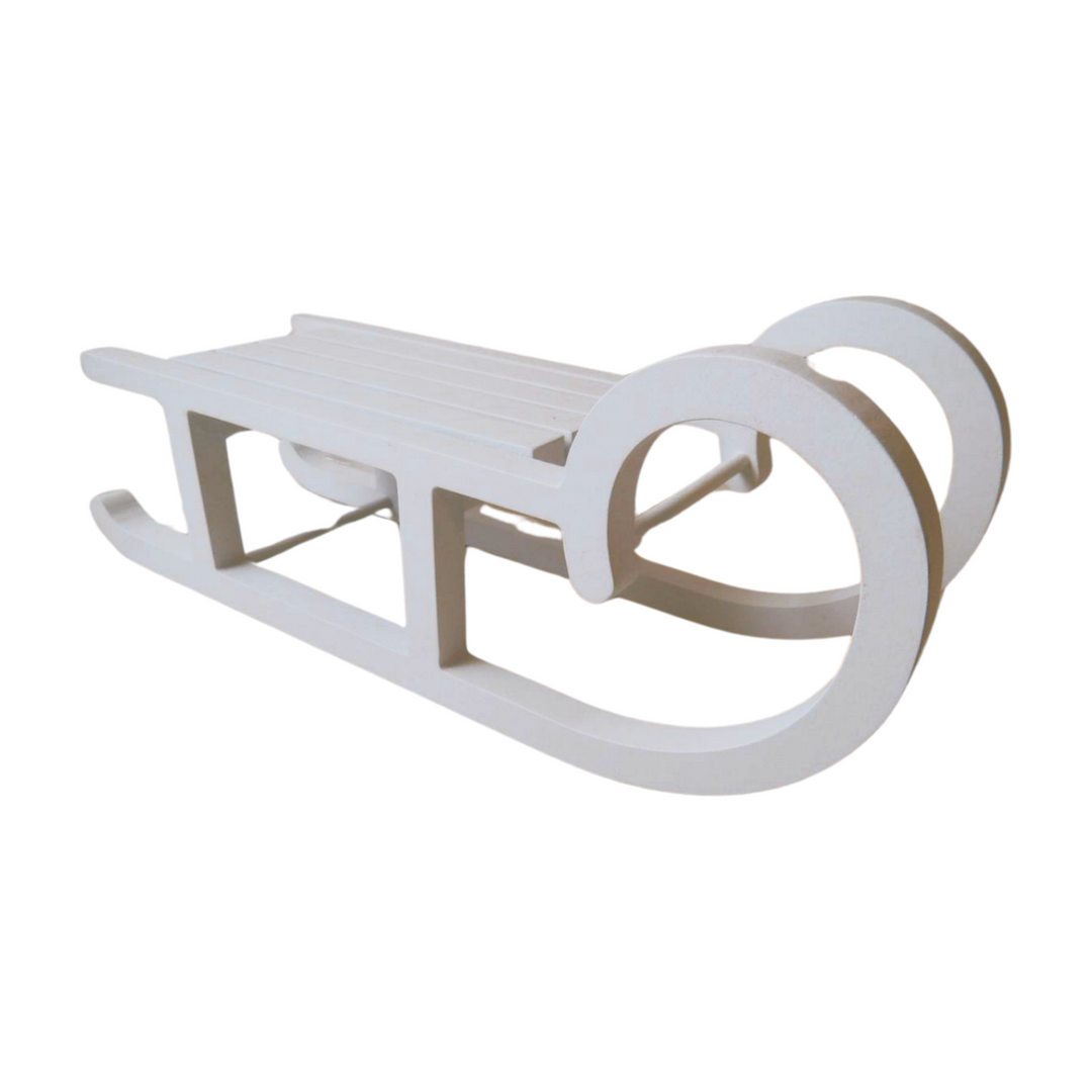 Large white wooden sleigh giftware from Cornucopia Home and Gift, decorative Christmas ornament for holiday decor.