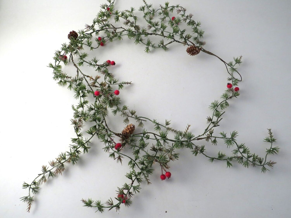 Red berry garland measuring 105cm from Cornucopia Home and Gift, ideal for festive home decor and giftware displays.