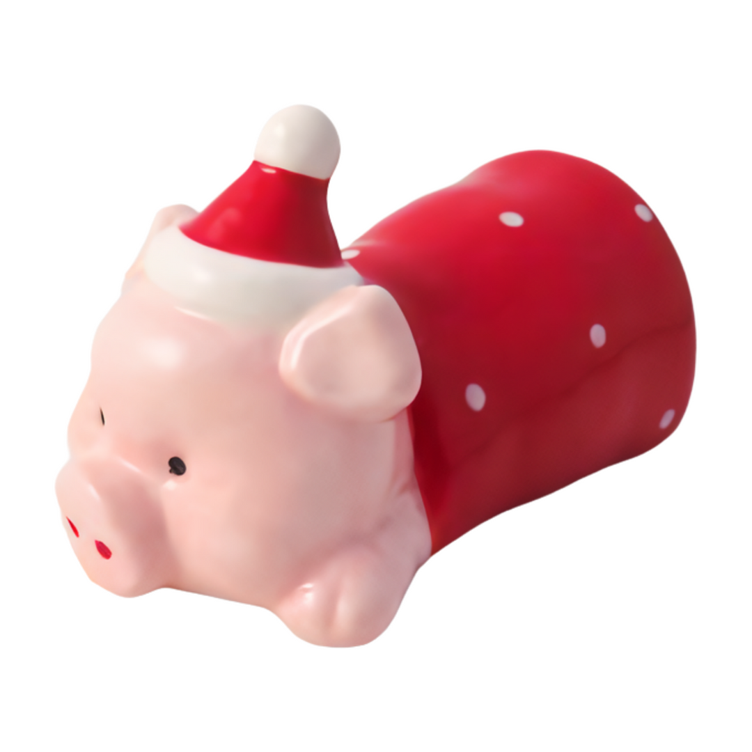 Large lying pig figurine from Cornucopia Home and Gift, Christmas 2025 giftware trading decorative pig in blanket figurine