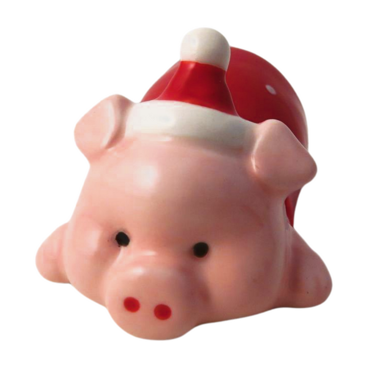 Large lying pig figurine from Cornucopia Home and Gift, festive Christmas giftware trading item, detailed pig in blanket design