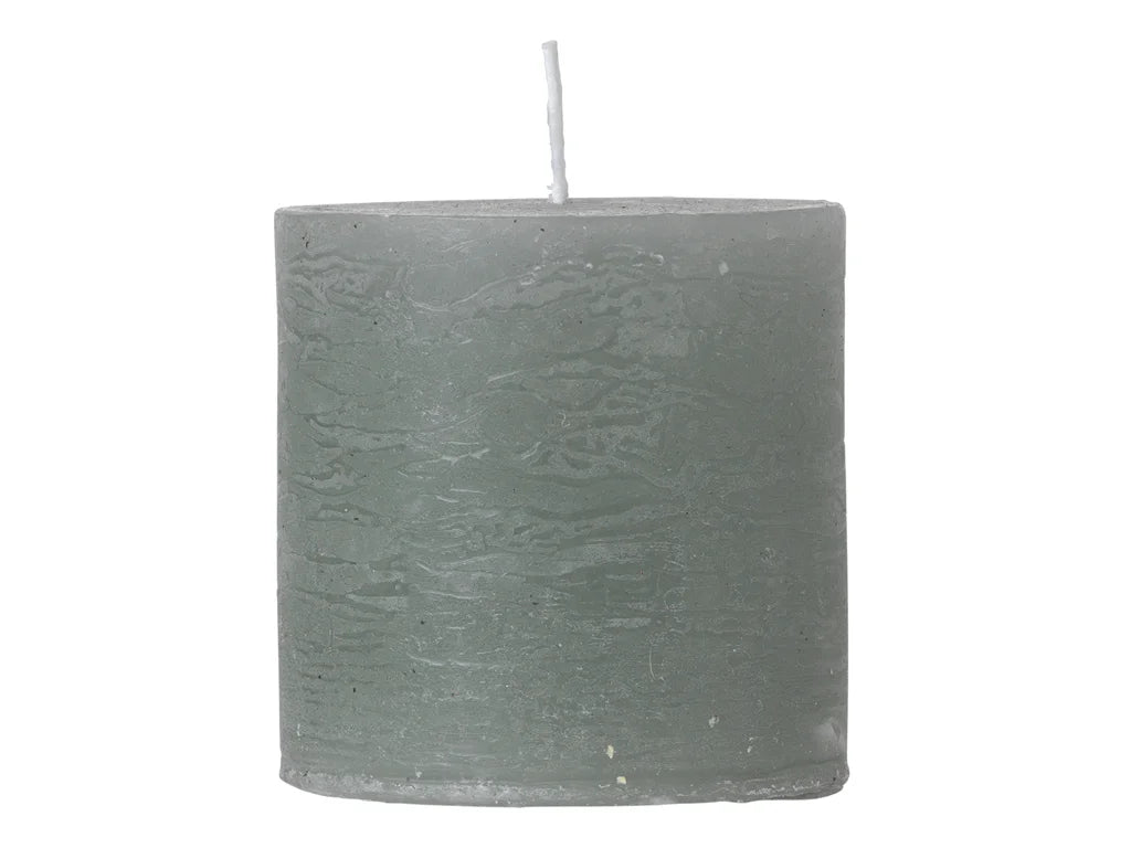 Rustic Grau 5x5cm candle from Cozy Living by Cornucopia Home and Gift, showing a gray textured candle on a wooden surface