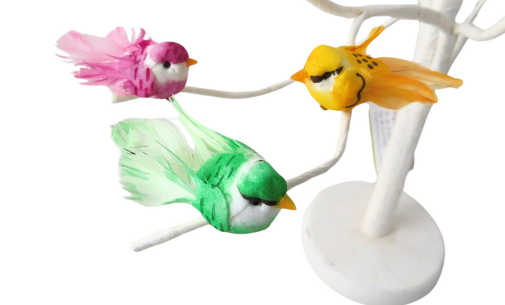 Colorful mini bird on clip, decorative giftware by Cornucopia Home and Gift, featuring vibrant feathers and a metal clip for display.