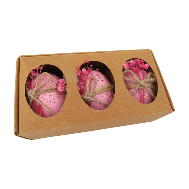 Set of three decorative eggs with dried flowers in mixed colors, crafted by Cornucopia Home and Gift, ideal for giftware displays.