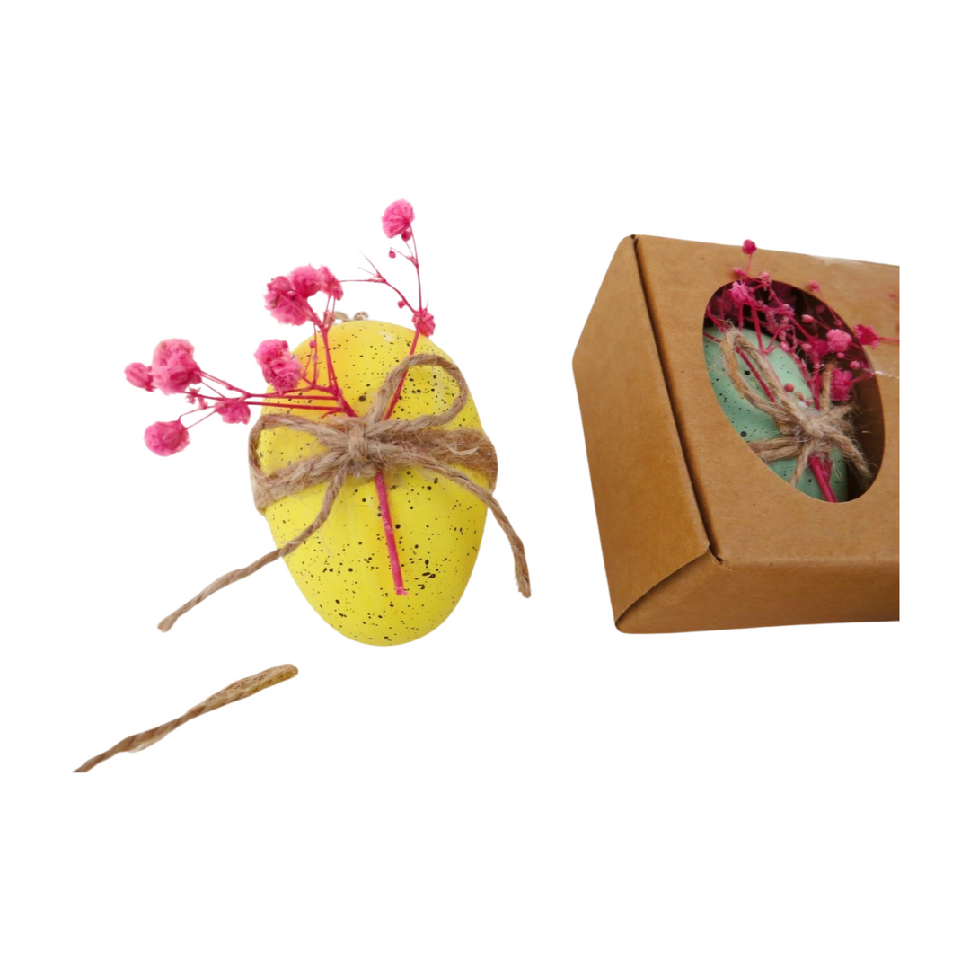 Set of three decorative eggs with dried flowers in mixed colors by Cornucopia Home and Gift, perfect for giftware or home decor.