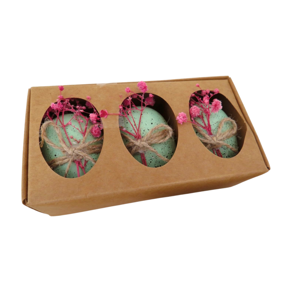 Set of 3 decorative eggs with dried flowers by Cornucopia Home and Gift, featuring colorful, textured floral designs in giftware style.