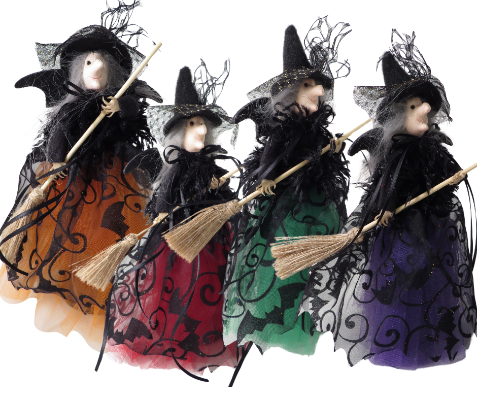 Four assorted standing witch figurines from Cornucopia Home and Gift, detailed giftware trading decor for Halloween or autumn displays.