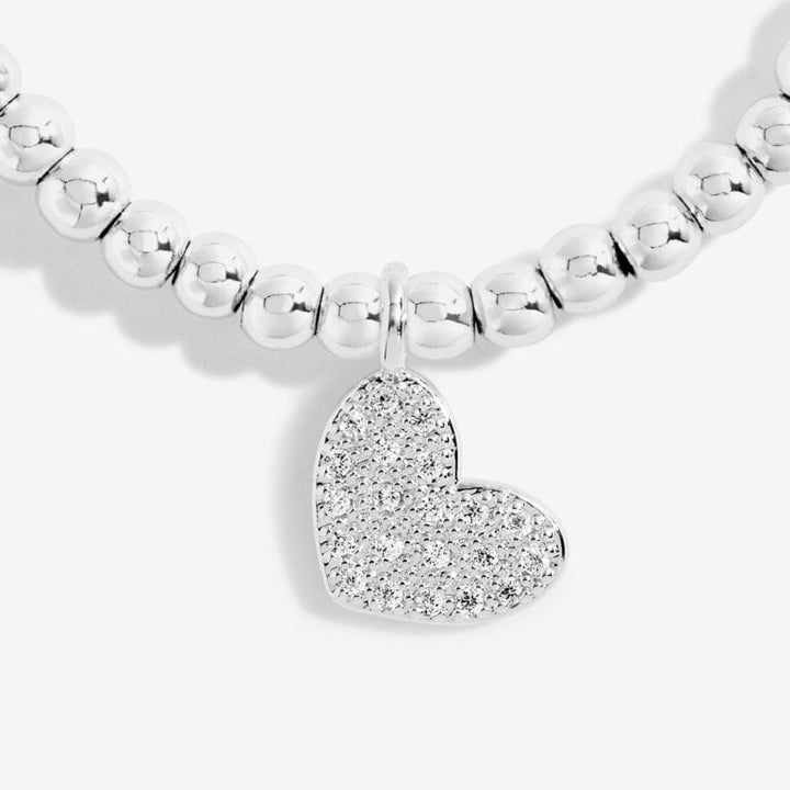 Gold-plated "A Little Enchanting 18" bracelet by Joma Jewellery featuring delicate charm and adjustable chain.