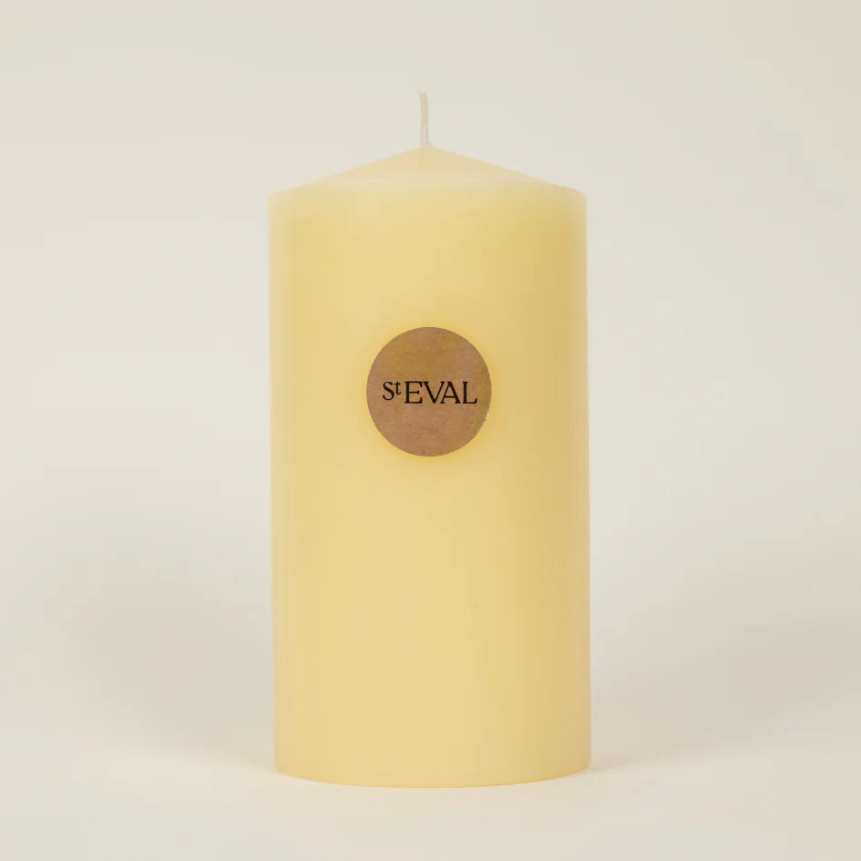 St Eval 4x8 inch church candle in white with a simple, smooth surface, suitable for religious or decorative use.
