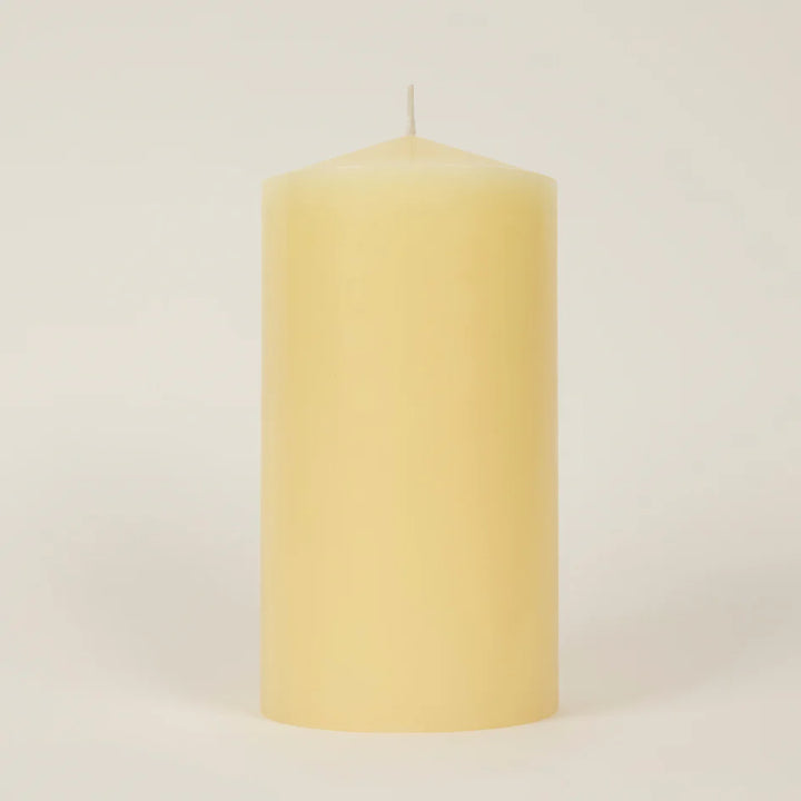 St Eval 4x8 inch church candle with white wax and simple design, ideal for religious or decorative purposes