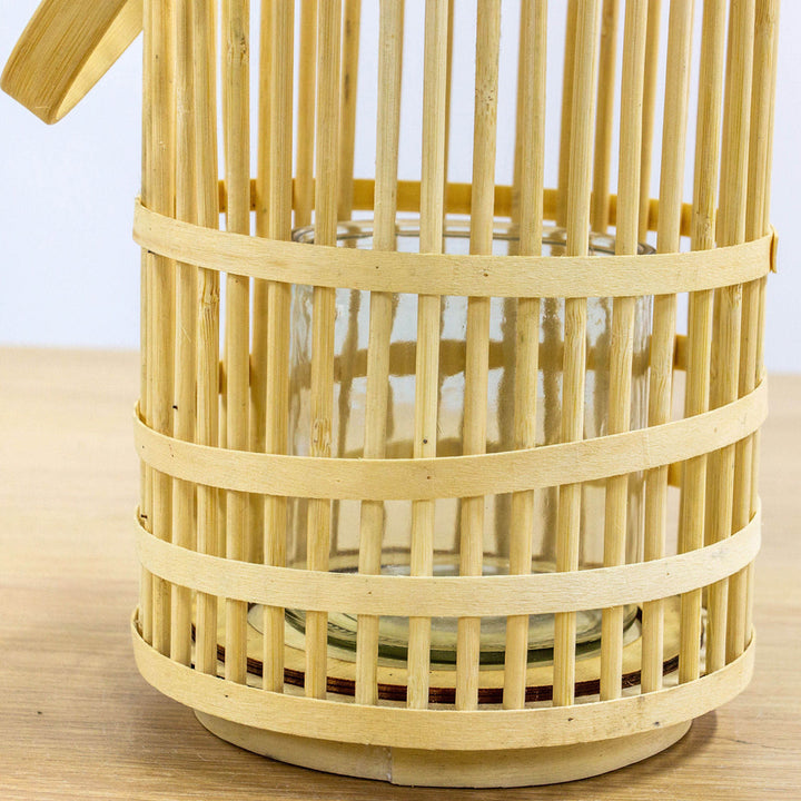 Natural bamboo rattan lantern with intricate woven design, perfect for home decor from Cornucopia Home and Gift.