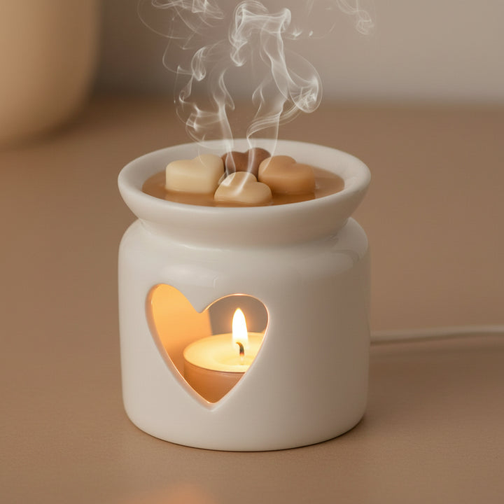 White Heart Oil Burner by Freckleface, 7cm, from Cornucopia Home and Gift, showcasing a decorative ceramic heart-shaped design.