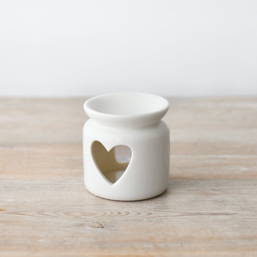 Freckleface White Heart Oil Burner from Cornucopia Home and Gift, 7cm tall with a smooth, heart-shaped ceramic design.