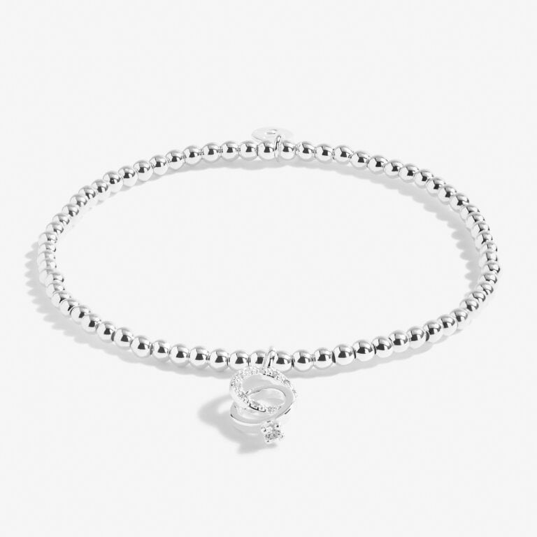 A Little Miss to Mrs bracelet by Joma Jewellery featuring a delicate silver chain and charm with elegant script design.