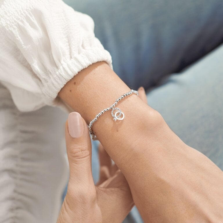 A Little Miss to Mrs bracelet by Joma Jewellery featuring delicate gold-tone chain and charm for special occasions.