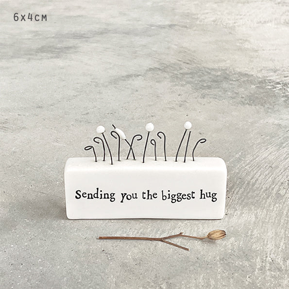 East of India porcelain scene figurine titled "Sending You the Biggest Hug" by Cornucopia Home and Gift, featuring a heartfelt hugging scene.