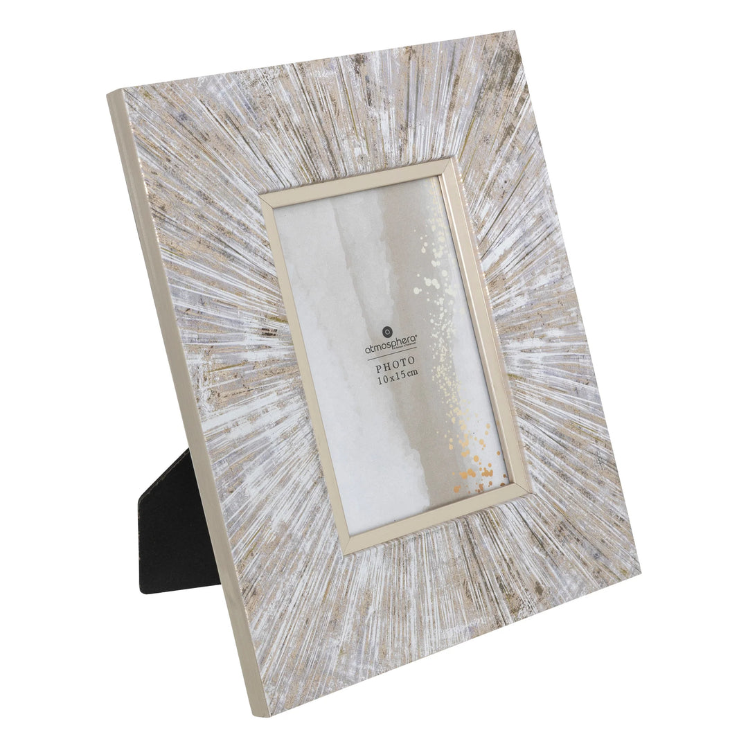 Rectangular starburst photo frame by Cornucopia Home and Gift, stylish decorative photo display with a starburst design.
