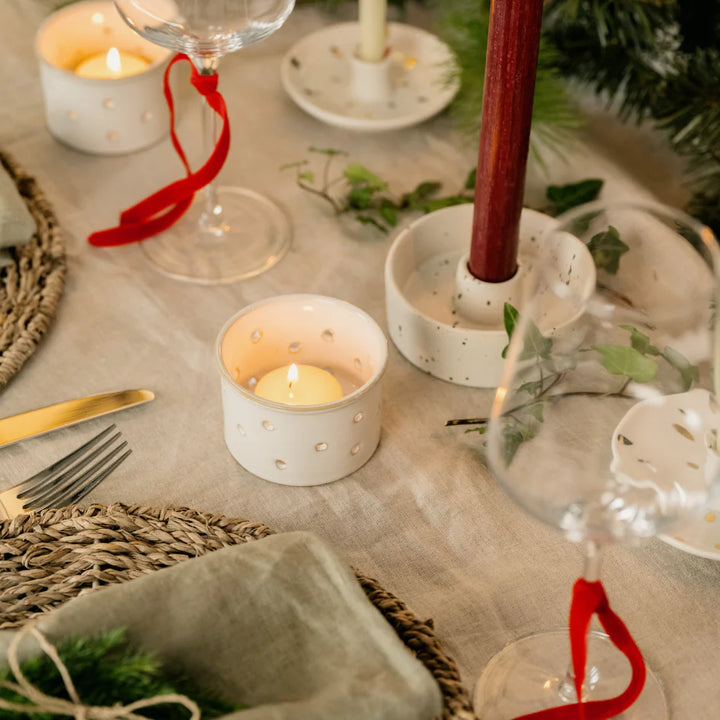 Set of five St Eval Christmas Winter Thyme scented tealights in clear holders, perfect for festive winter ambiance.