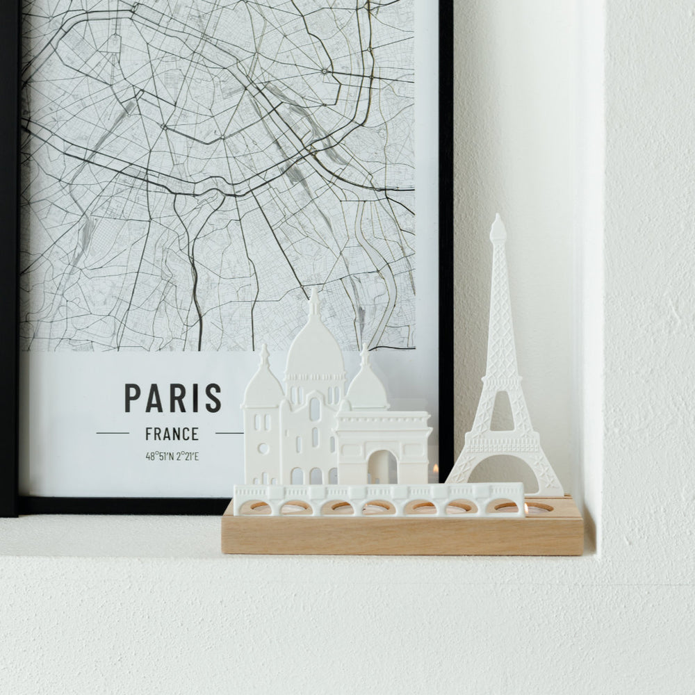 Radër City Skyline Paris by Cornucopia Home and Gift featuring a decorative wheel with a Paris cityscape design.