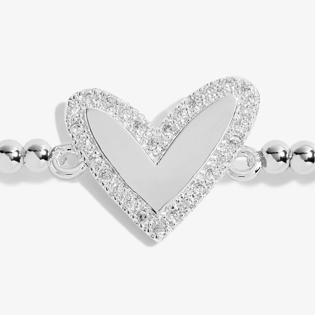 Joma Jewellery A Little Another Year Lovelier bracelet featuring delicate gold chain and charm, perfect for special occasions.