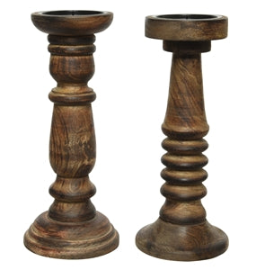 Two mango wood candlesticks with assorted finishes, designed by Cornucopia Home and Gift, perfect for decorative lighting.