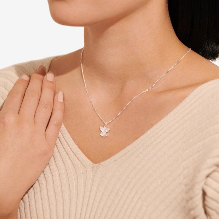 Joma Jewellery "Angels Watching Over You" necklace featuring a delicate angel pendant on a silver chain.