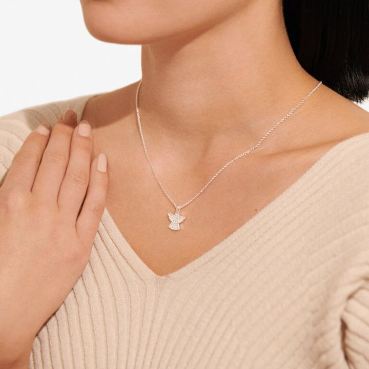 Joma Jewellery "Angels Watching Over You" necklace featuring a delicate angel pendant on a silver chain.