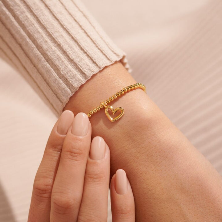 Gold birthday girl bracelet by Joma Jewellery featuring a delicate charm and elegant design for special occasions.