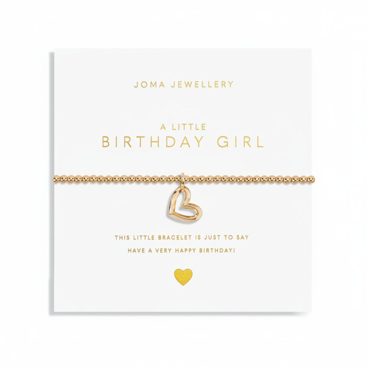A gold-plated bracelet with a heart charm, presented on a card that reads &